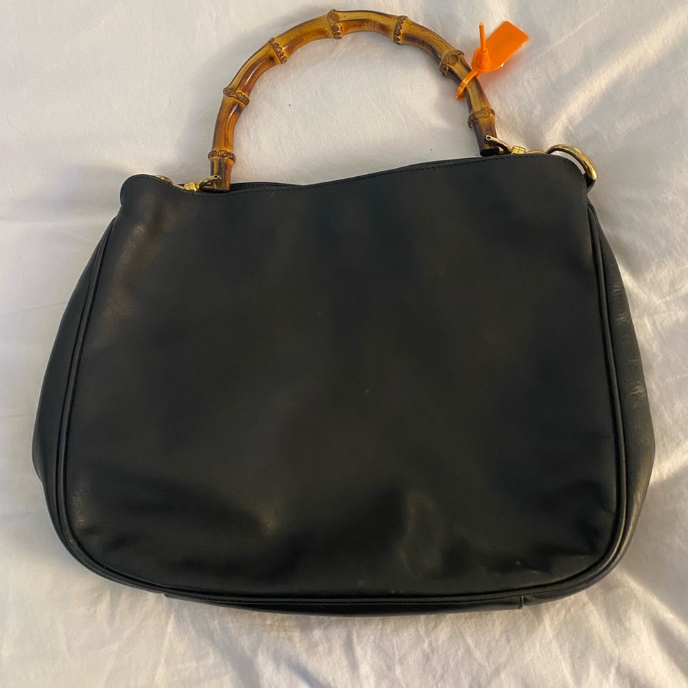 Vintage Gucci Hobo Two Way leather Handbag with strap and bamboo handles.